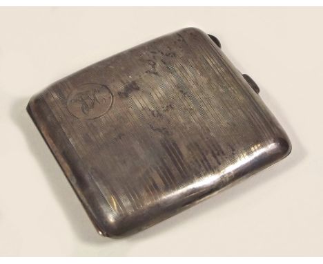 CIGARETTE CASE. An engine turned silver cigarette case.