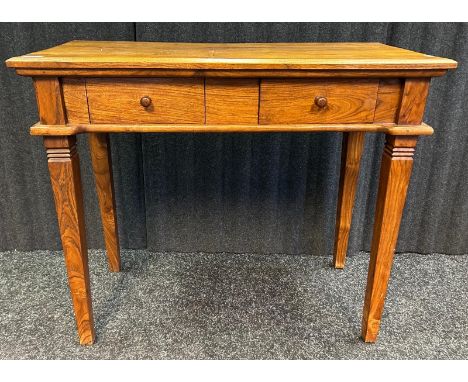 A contemporary console table with two frieze drawers raised on squared tapered legs [75 x 90 x 44cm]