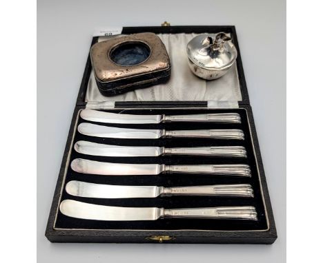 Cased set of six silver handled knives together with silver photo frame and item of scrap silver
