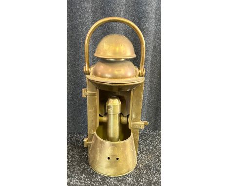 An antique brass Ship's Cabin / Wardrobe candle lamp.
