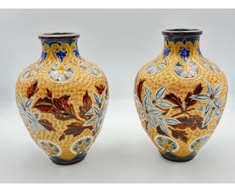 Eliza Simmance for Royal Doulton, pair of Doulton Lambeth vases, swollen vessel with cylindrical neck and having a beaded moo