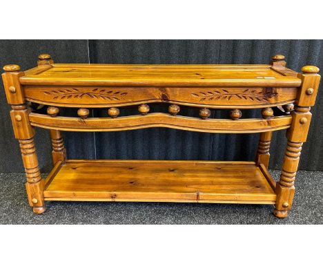 A contemporary pine console table [69 x 122 x 41cm]