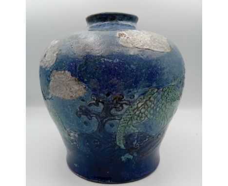 Blue Pottery Weed Vase, likely a piece from Holyrood Pottery which was active from 1911-1927. Features seascape with stylized