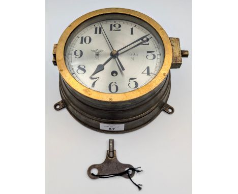 Bulk head clock in the manner of Kriegsmarine, working with key