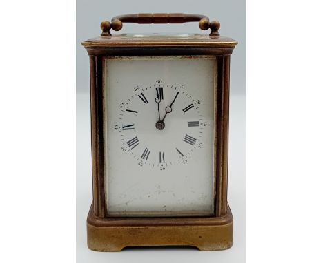 19th Century Brass Carriage Clock marked M.L.J 1884 and M.J.S 1934[13cm]