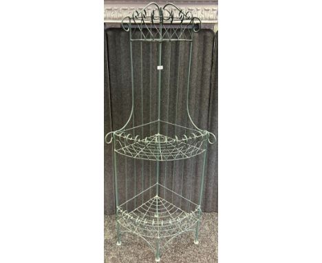 A metal green painted three tier plant stand
