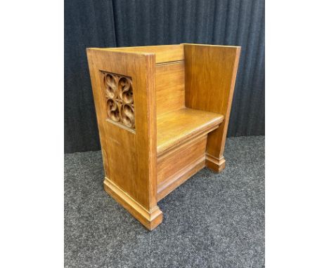 A church pew seat with high back &amp; high sides with carved squared sections. [83.5x71x41cm]
