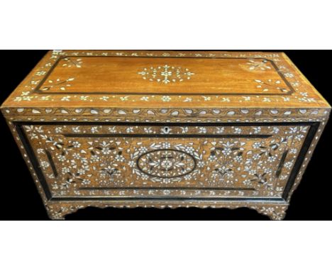 A 19th century chest, hardwood with Mother of Pearl inlay throughout, raised on bracket legs. [65 x 111 x 49.5cm]