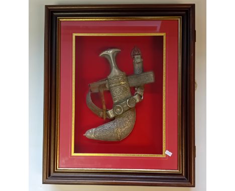 Framed Omani Khanjar, a traditional dagger from Oman.Traditionally worn by men for ceremonial occasions and part of the Natio
