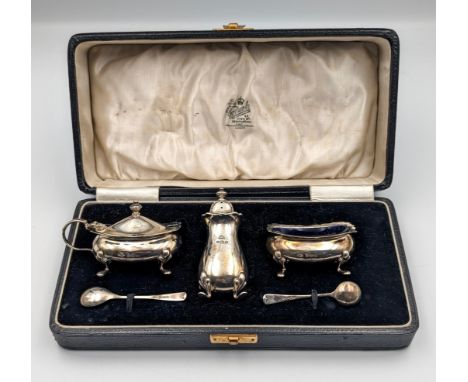 Boxed silver three piece condiment set with blue liners and spoons, Adie Brothers Ltd, Birmingham 1939Weight - 139.20g