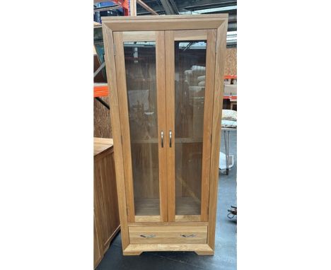 Light wood two door display cabinet