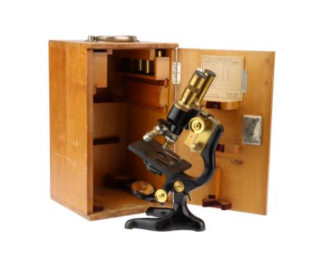 A Leitz Binocular Compound Microscope With Provenance, German, c.1920, signed to the front of the binocular head, Ernst Leitz