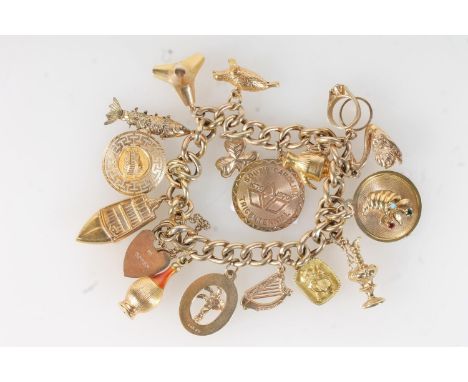 9ct gold charm bracelet with sixteen dependant charms, mainly 9ct and one 14ct, charms to include harp, fish, swan and others