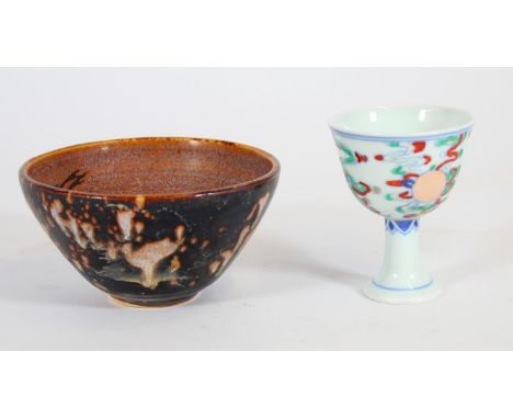 Chinese Doucai glaze small pedestal cup, H7.5cm, together with a Thai stoneware pottery cup with brown mottled glaze and inte