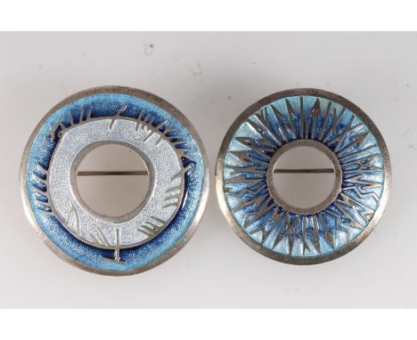 Sheila Fleet of Orkney, a contemporary Scottish silver and enamel brooch in the Skyran design and another in the Runic Iris p