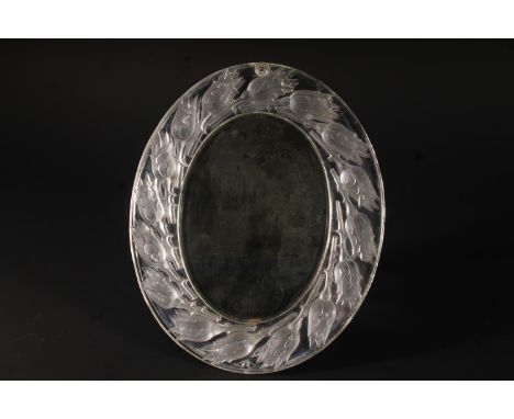 Lalique 'Bouton de Roses' easel backed table mirror, the bevelled plate within an oval moulded frame of repeating frosted ros