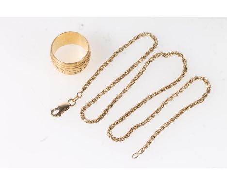 18ct yellow gold chunky wedding band with heavily decorated exterior, size R, 10.7g and a 9ct gold linked necklace, 41cm long