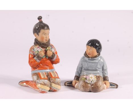 Royal Copenhagen figural pair, of a 'Gronland' Greenland boy and girl in traditional dress, max H14cm. CR : Losses to flowers