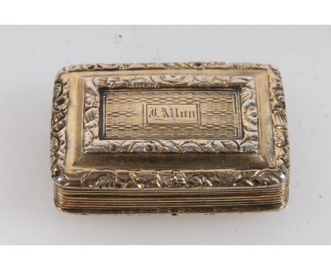 Geo. IV silver gilt vinaigrette, the cover and base with cast floral scroll borders and engine turned bands, opening to revea