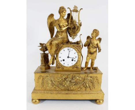 French Empire Charles X gilt ormolu mantle clock, of the neo-classical taste c1830, finely cast with Psyche instructing Cupid