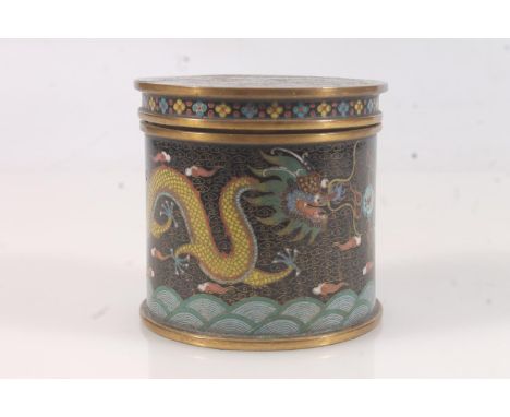 Chinese cloisonne black enamel jar with cover, The cylindrical jar bearing allover underglazed five claw dragons chasing the 
