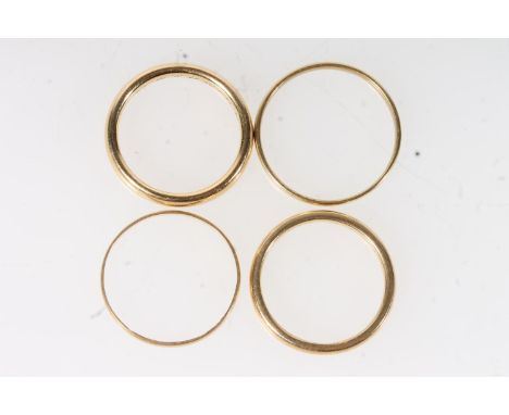 Four 18ct gold wedding bands of plain form, two size K, size N and size P, 7.6g.