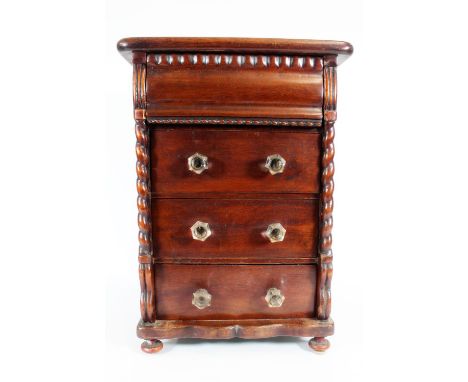 Victorian mahogany apprentice piece modelled as a Scotch chest, with barley twist pilasters, raised on four bun feet, H51.5cm