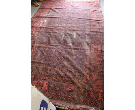 Baluchistan small carpet, the indigo ground with repeated stylised ornament, the main square border with mottle guards, low, 