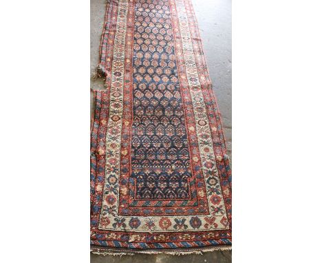B 2 (4) Hamadan runner, indigo field, repeated boteh ornament, differing colour ornament highlighted ivory, powder blue &amp;
