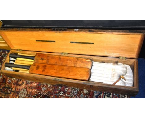 Two vintage Frowd's patent cricket bats, by J Lillywhite Frowde & Co, together with six ash cricket stumps in wooden outer bo