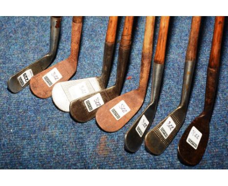 Eight vintage hickory shafted golf clubs, comprising of Forgan, St Andrews 1 Iron, 104cm long, Special Straight Line Putter b