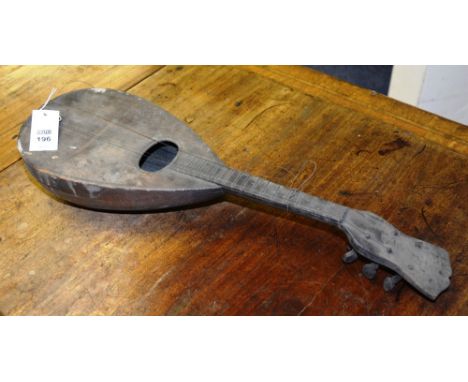 A bow back mandolin, needing re-strung, 59cm long