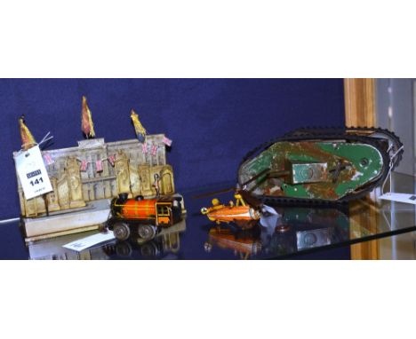 A tin plate clockwork model of Buckingham Palace 'Changing of the Guard', 22cm diameter, together with a vintage Japanese tin