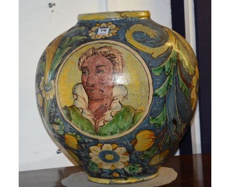 A 19th century Majolica pottery jar, of large bulbous form, decorated with portrait panels on swag and foliate glazed ground,