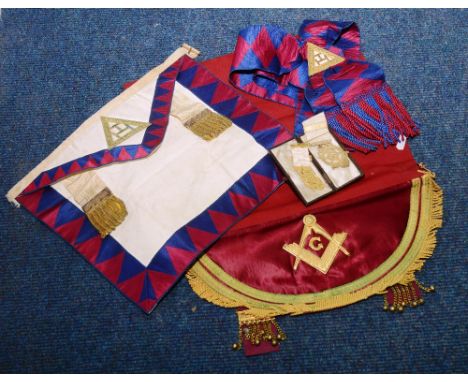 A quantity of Masonic ephemera, comprising of two gilt metal medals, with clasps on white ribbons, three aprons, sash and a p