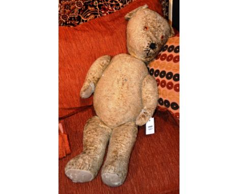 A vintage mohair stuffed teddy bear, of large form, with replacement eyes (a/f), 82cm long