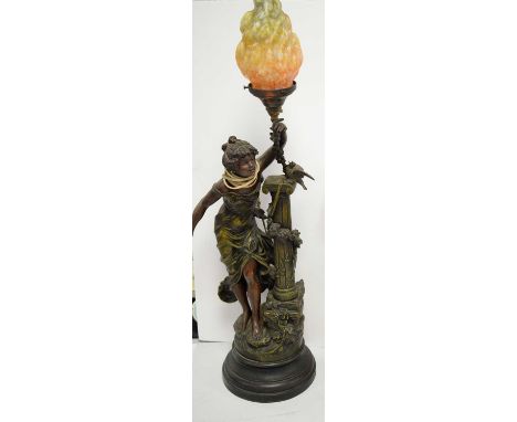 Bronzed spelter figural lamp, modelled as a lady holding a torch, with mottled orange flame shade, on circular stand, 85cms h