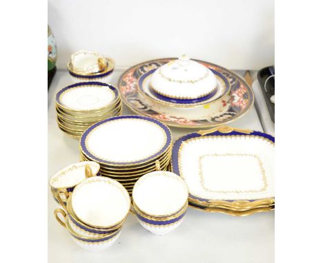 Coalport part tea service, comprising seven cups, ten side plates, ten saucers, two sandwich plates, lidded dish, cream and s