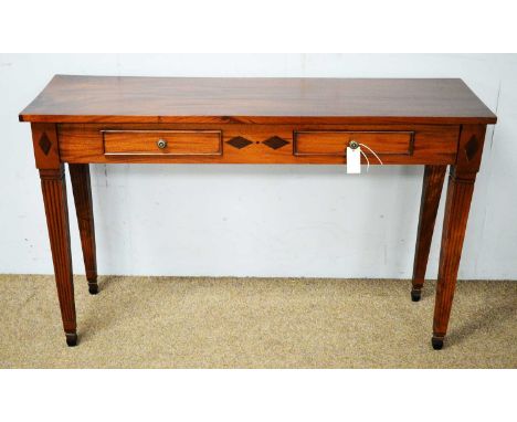 A 20th Century mahogany console table rectangular top above two frieze drawers raised on square tapering and fluted legs term