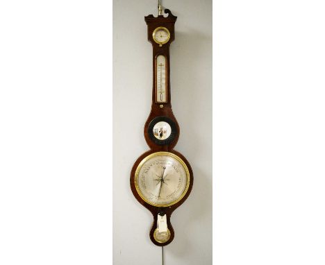 An early 20th Century mahogany barometer, by A.Donegan, Edinburgh, the broken swan neck pediment above a silvered thermometer