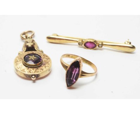 A 19th Century amethyst and yellow metal drop pendant, the central circular facet-cut amethyst centred by a gold star with se