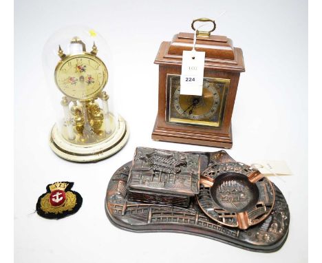 20th century German anniversary clock, the dial, pillar supports and circular base decorated with roses and floral sprays, 23