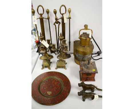 Brass ships lamp, 42cms high; along with brass and other items including two fire companion sets, pair of brass candelabra, e