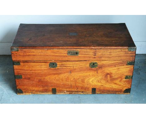 A late 19th/early 20th Century mahogany and sandalwood lined trunk, the rectangular and hinged top with brass to the corners 