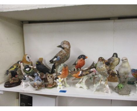 A collection of Goebel bird ornaments and others to include the Chancery Collection Goldfinch