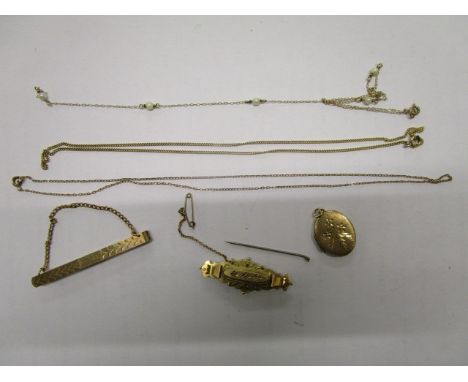 A selection of gold jewellery to include chain necklaces, a brooch set with a white stone, a pendant and other items