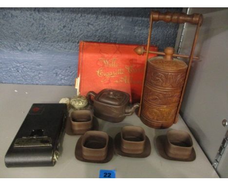 A mixed lot to include a Yixing teaset, a camera, cigarette cards and oriental trinket boxes