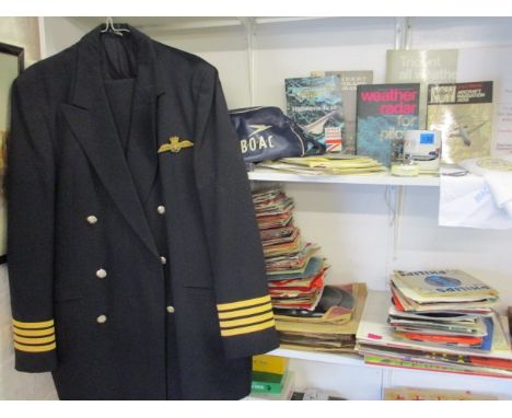 A collection of BOAC, BEA and BA pilot related ephemera and souvenirs to include Trident manuals and a pilot's uniform
