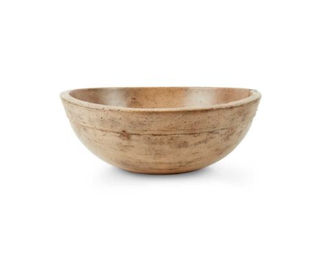 LARGE TURNED SYCAMORE DOUGH BOWL LATE 18TH/ EARLY 19TH CENTURY of slight oval form and deep outline, the exterior with a turn