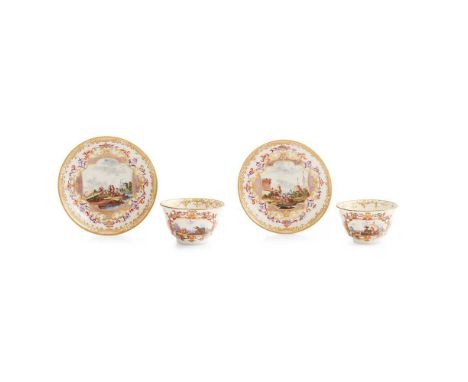 TWO MEISSEN TEA BOWLS WITH MATCHED SAUCERS CIRCA 1730-40 each painted with kauffahrtei quayside scenes, within a scrollwork c